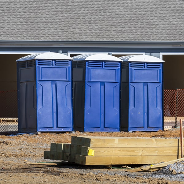 what is the cost difference between standard and deluxe portable restroom rentals in Lewiston